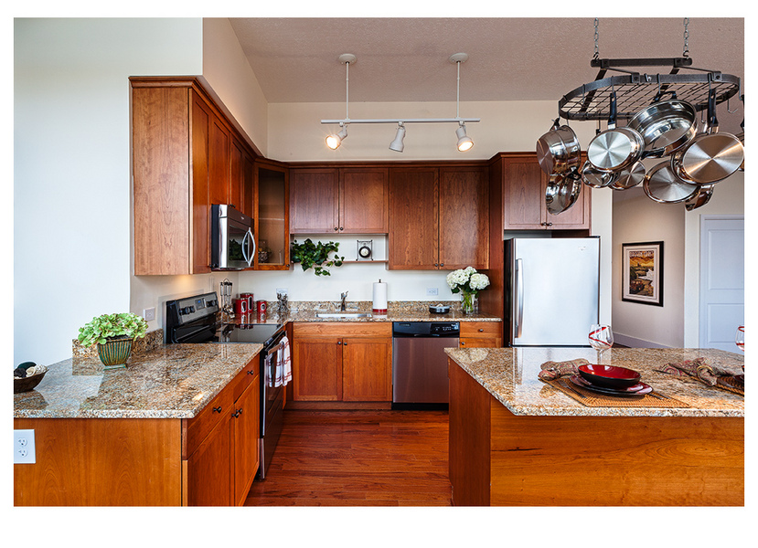 Interior architectural photograph at Cast Iron Lofts in Jersey City New Jersey.  City Homes and Gardens, Manhattan Building Company. Luxury rental apartments with numerous amenities. Swimming pool,gym,library,laundry in the apartments, high ceilings, wood floors, Viking appliances in the kitchen : IMAGES-Keywording : New York NY Architectural Photographer | Interior and Exterior
