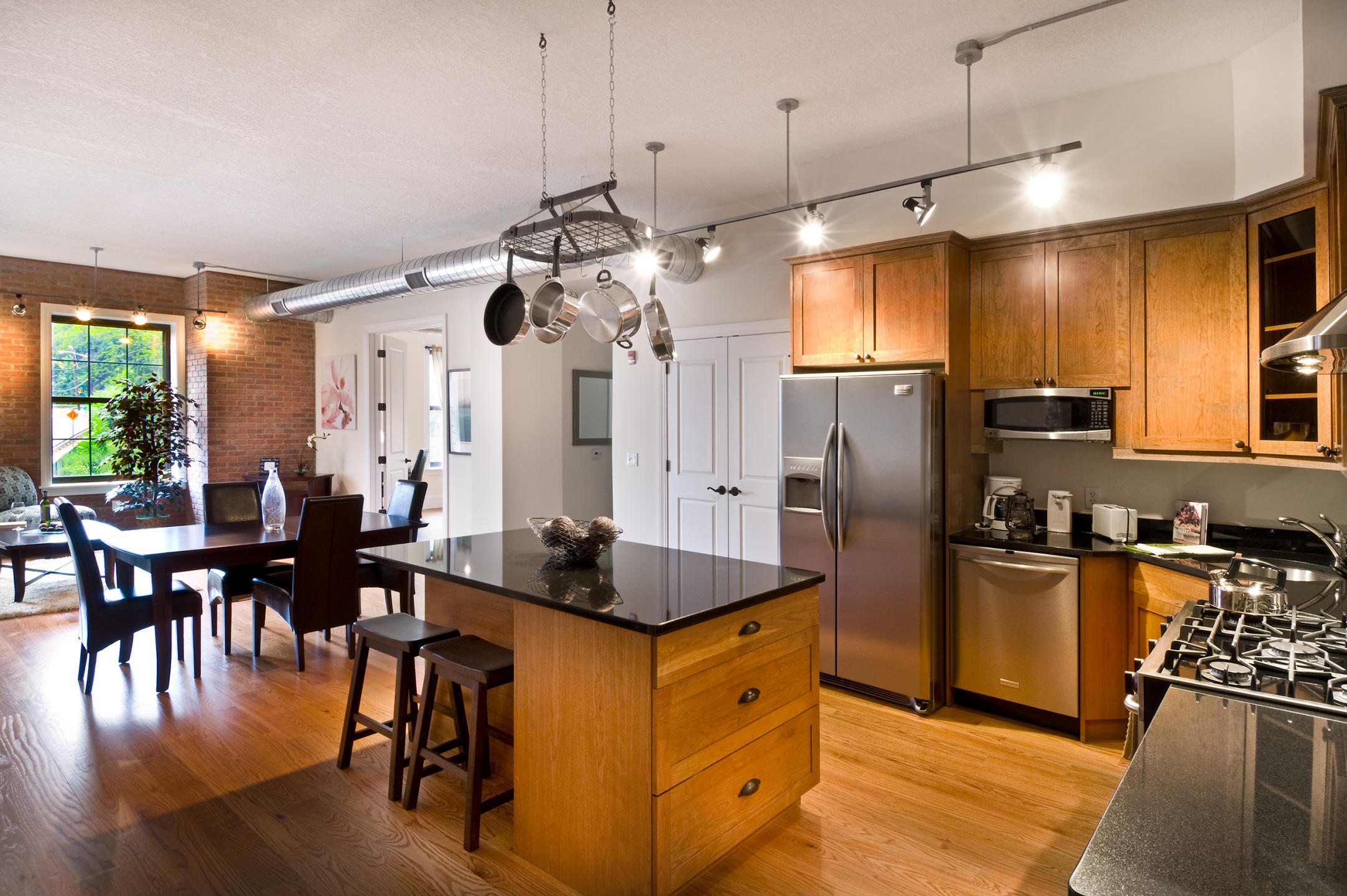 Interior architectural photograph at Cast Iron Lofts in Jersey City New Jersey.  City Homes and Gardens, Manhattan Building Company. Luxury rental apartments with numerous amenities. Swimming pool,gym,library,laundry in the apartments, high ceilings, wood floors, Viking appliances in the kitchen : IMAGES-Keywording : New York NY Architectural Photographer | Interior and Exterior