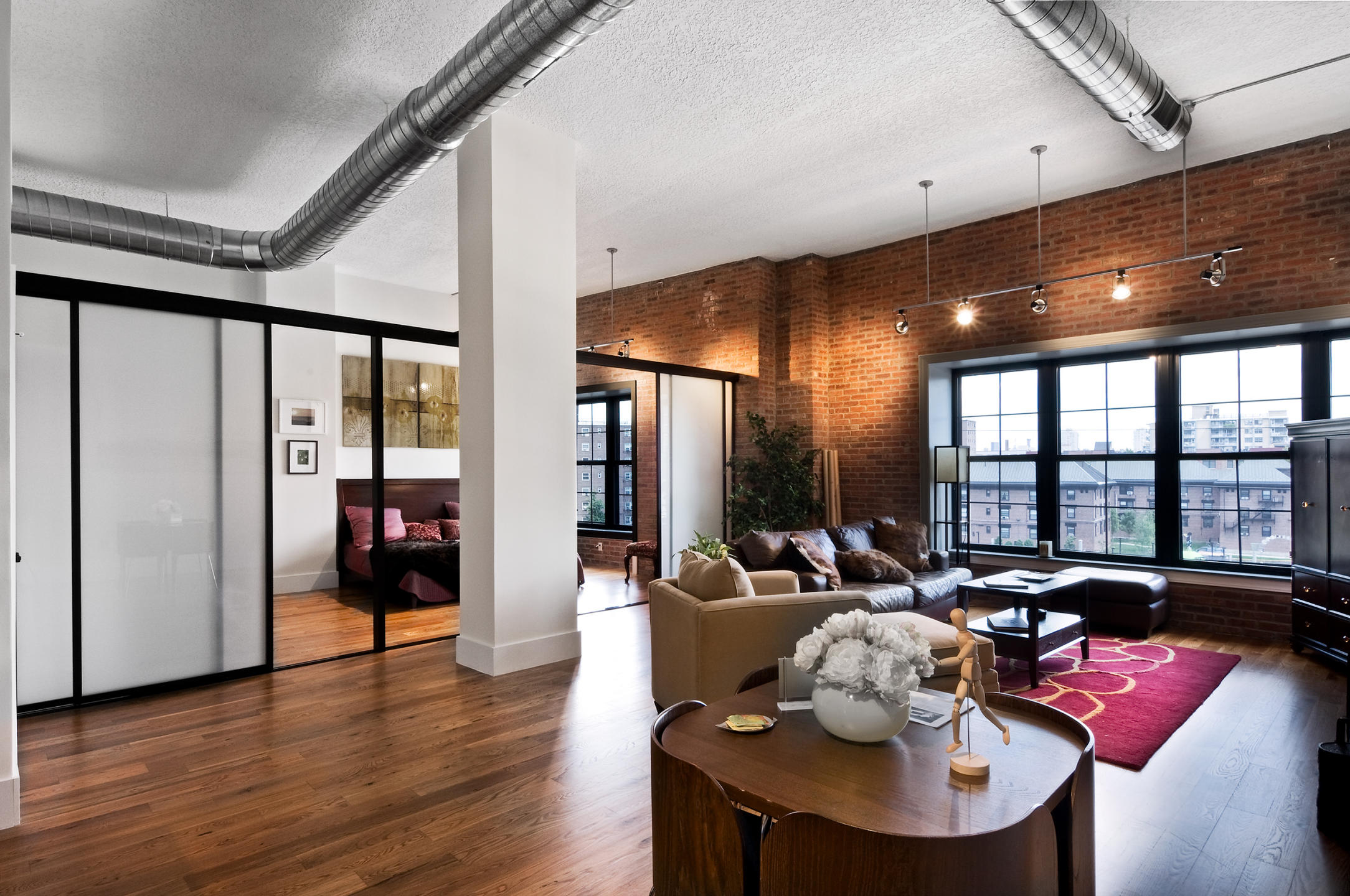 Interior architectural photograph at Cast Iron Lofts in Jersey City New Jersey.  City Homes and Gardens, Manhattan Building Company. Luxury rental apartments with numerous amenities. Swimming pool,gym,library,laundry in the apartments, high ceilings, wood floors, Viking appliances in the kitchen : IMAGES-Keywording : New York NY Architectural Photographer | Interior and Exterior