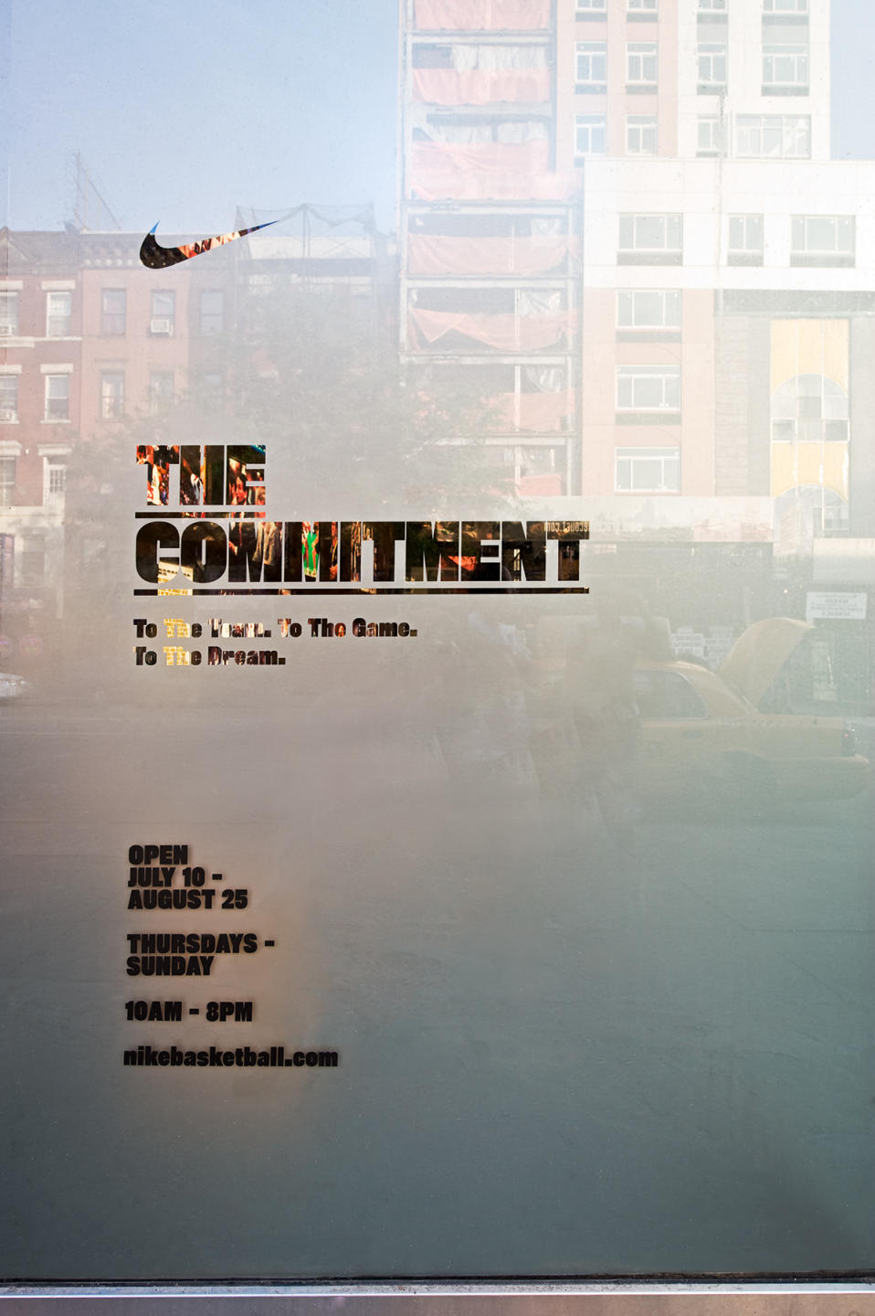 frosted glass front door of the NIKE Gallery  in Harlem, NYC  : NIKE : New York NY Architectural Photographer | Interior and Exterior
