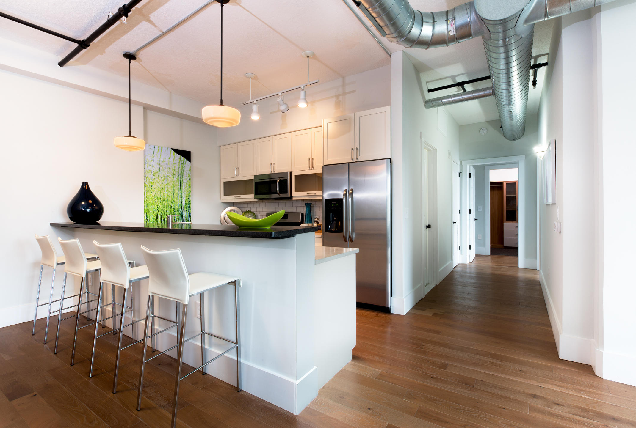 Interior architectural photograph at Cast Iron Lofts in Jersey City New Jersey.  City Homes and Gardens, Manhattan Building Company. Luxury rental apartments with numerous amenities. Swimming pool,gym,library,laundry in the apartments, high ceilings, wood floors, Viking appliances in the kitchen : IMAGES-Keywording : New York NY Architectural Photographer | Interior and Exterior