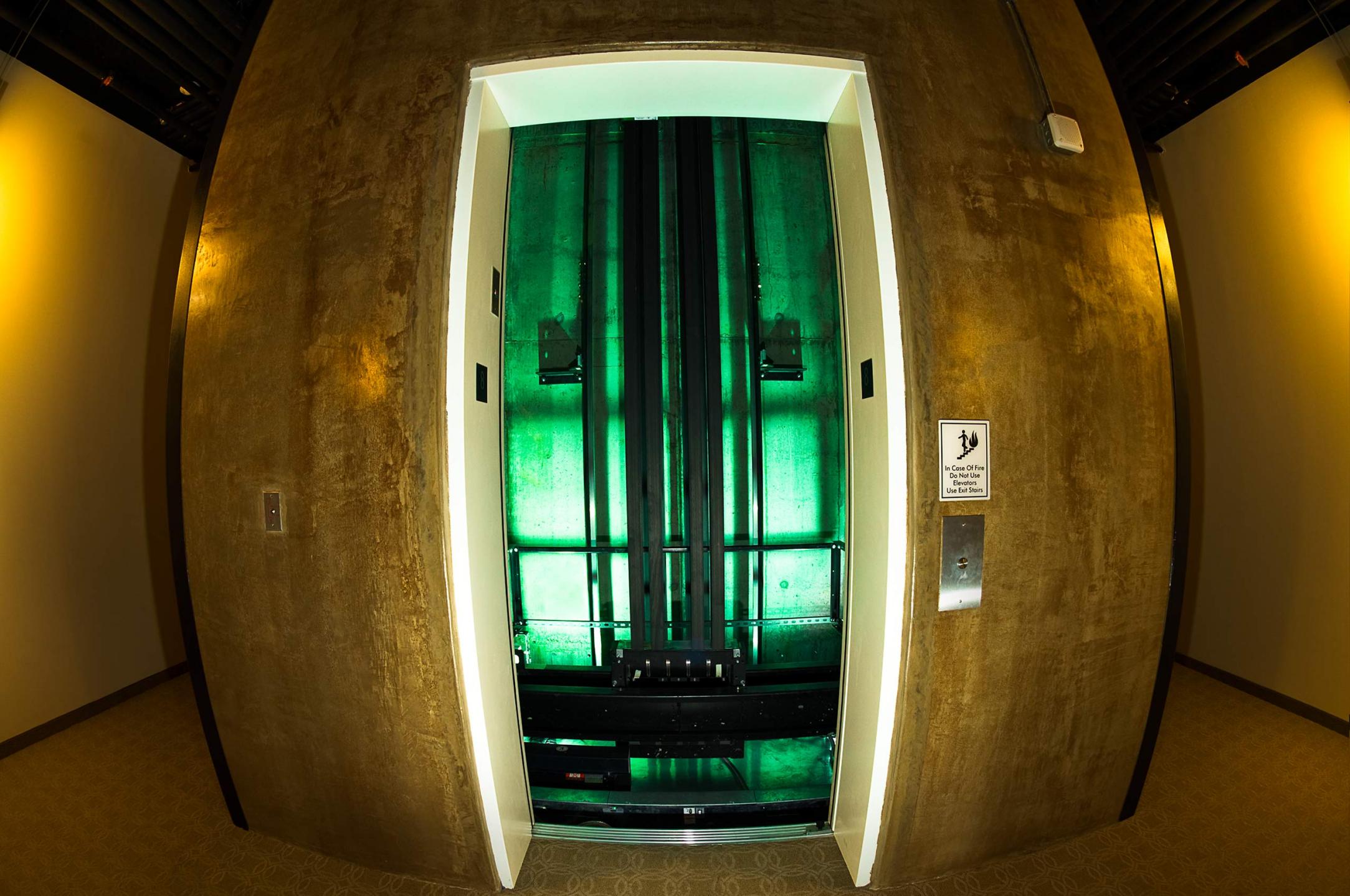 Otis iGen elevator, the first in the country, used at the Proximity Hotel which reallocates energy as it is used.  The photograph is intentionally distorted. : Solar Powered Hotel  : New York NY Architectural Photographer | Interior and Exterior Photography