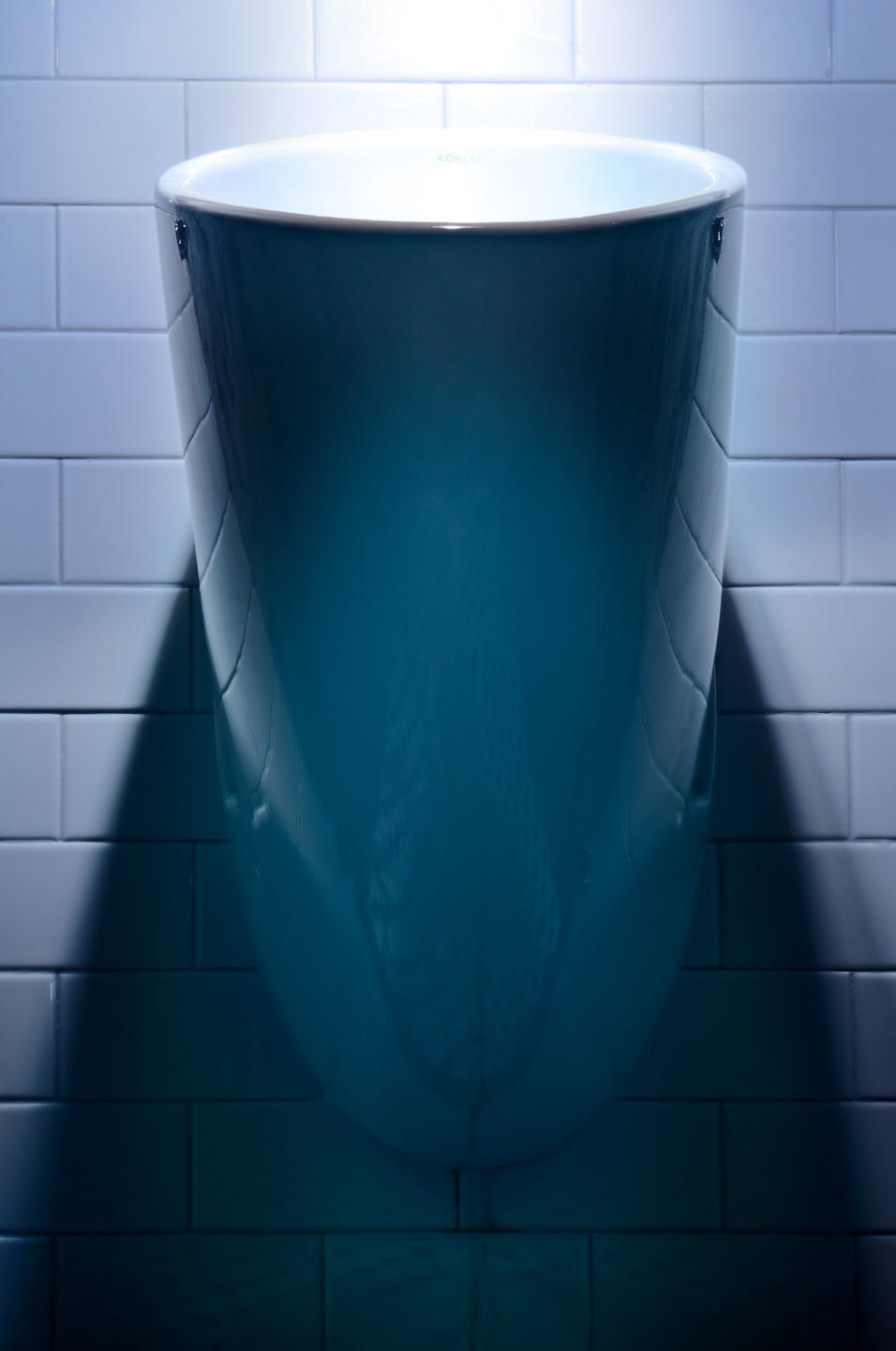 Kohler waterless urinal which saves the hotel money and thousands of gallons of water. : Solar Powered Hotel  : New York NY Architectural Photographer | Interior and Exterior Photography