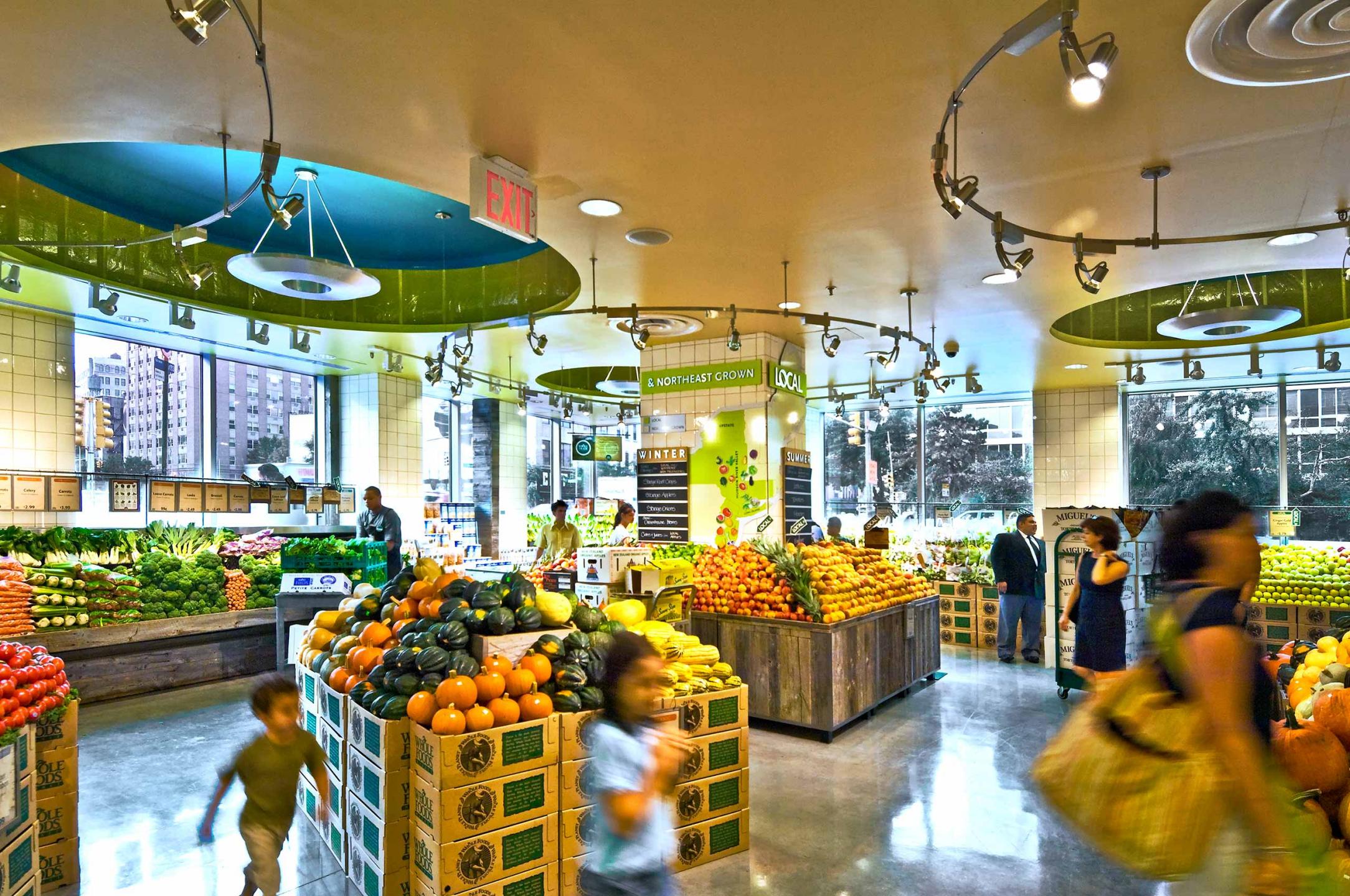 Whole Foods Market located on Houston St., NYC with interior design by SBLM in NYC and Bottinogrund in Austin, Texas. Client requested wide view and to have people interacting in the space. : Whole Foods Market : New York NY Architectural Photographer | Interior and Exterior