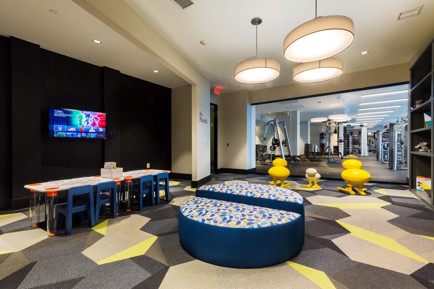 Soho Lofts - children's playroom with view from gym for parents to keep an eye on their kids : Soho Lofts : New York NY Architectural Photographer | Interior and Exterior Photography