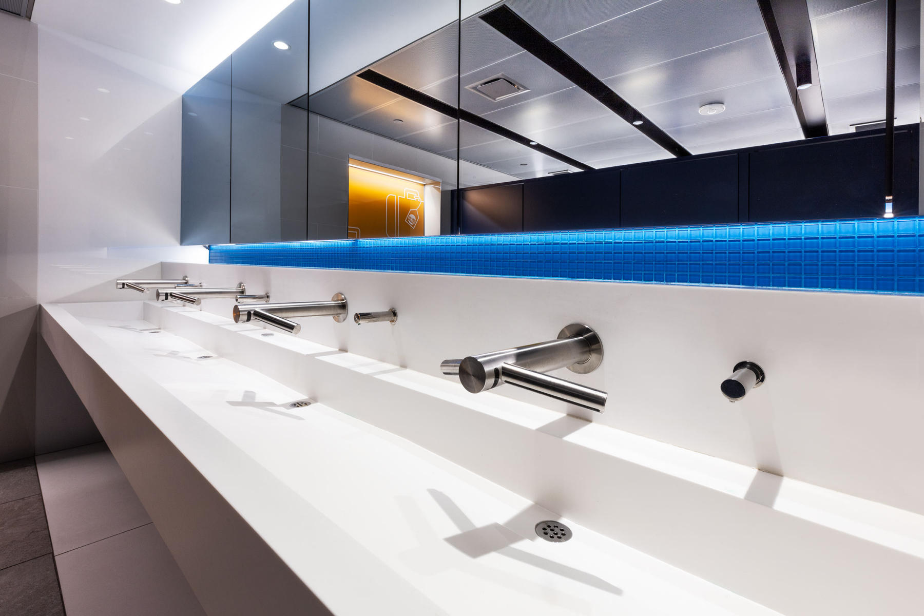 JFK Jamaica Airtrain Station - sinks with faucets that have a relationship shape to aircraft. : Port Authority NYNJ : New York NY Architectural Photographer | Interior and Exterior Photography