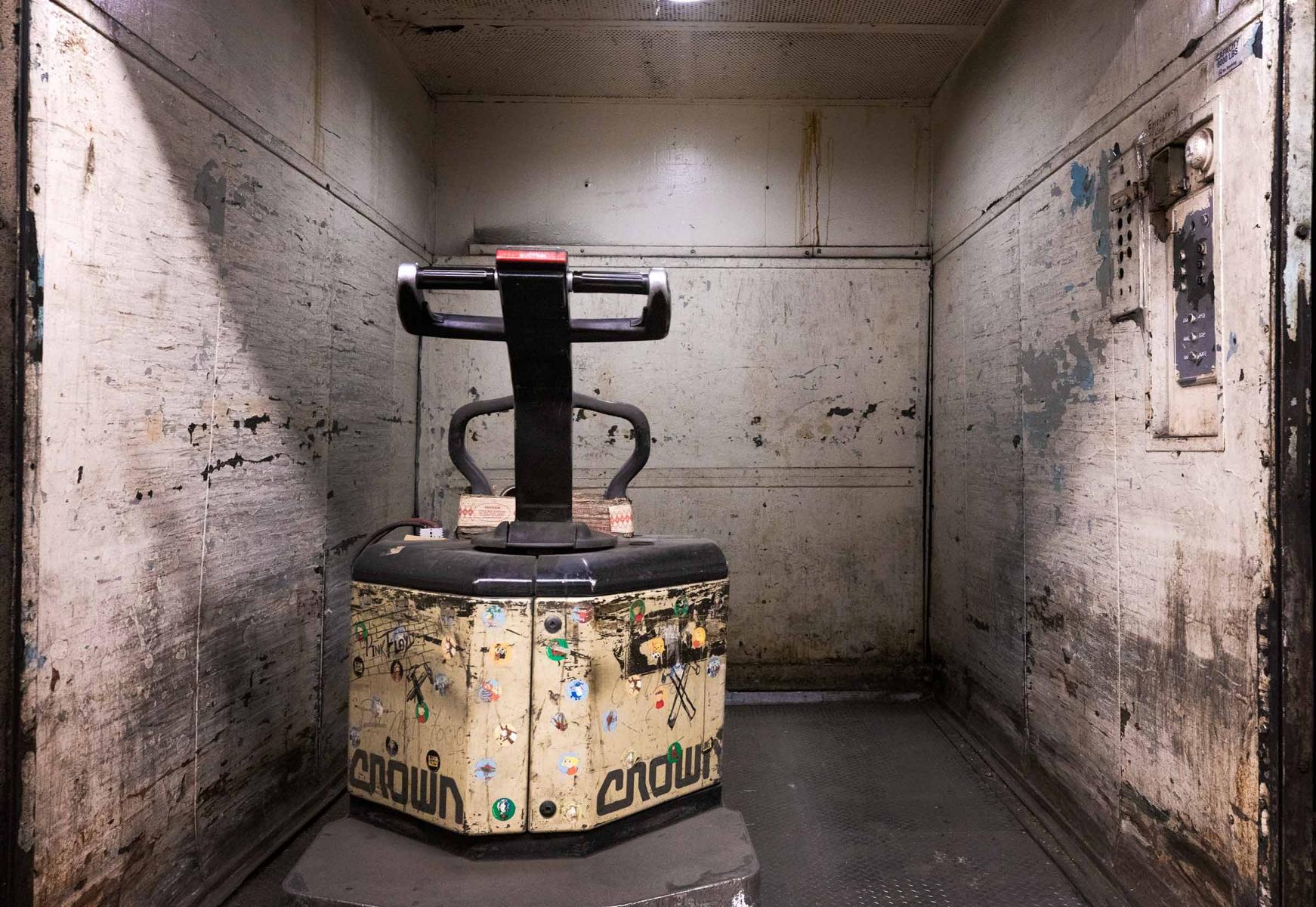 Freight elevator with skid mover used by STATCO facilities. : Emerson Radio Renovation : New York NY Architectural Photographer | Interior and Exterior
