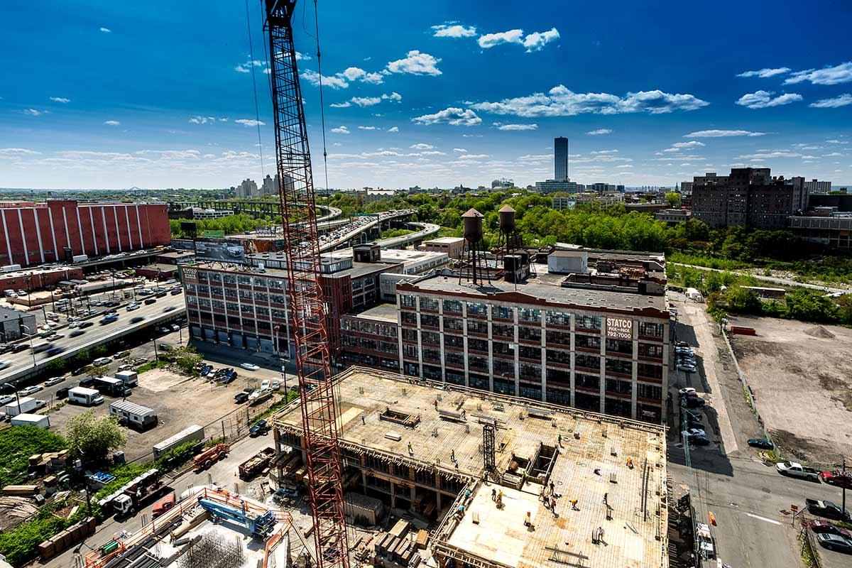 Westward view showing relationship of Emerson Radio building to the NJ turnpike. : Emerson Radio Renovation : New York NY Architectural Photographer | Interior and Exterior