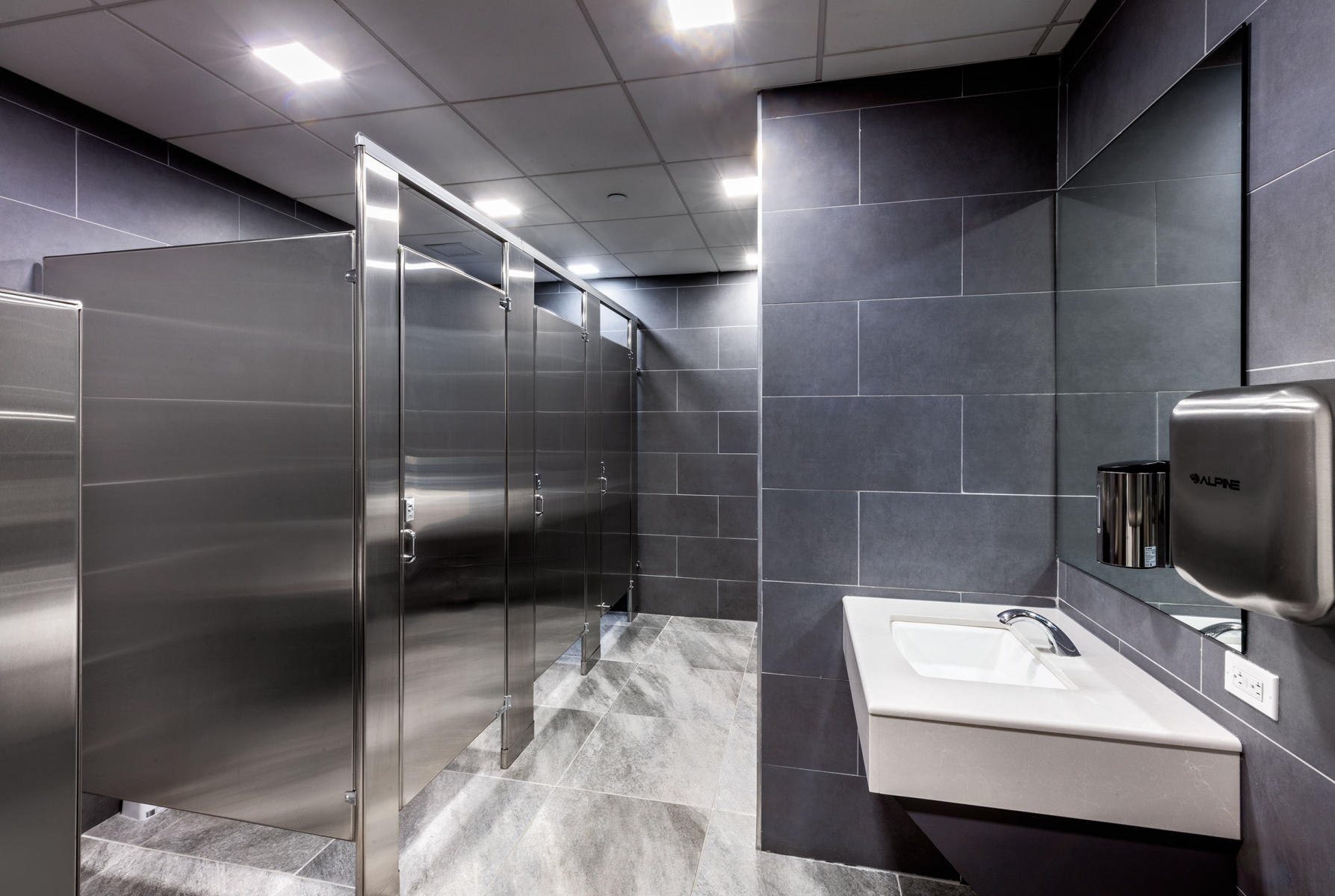 Men's washroom one of the floors at the fashion showroom in the Manhattan  garment district.. : Dynamic Construction NY : New York NY Architectural Photographer | Interior and Exterior Photography