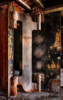 Bank vault hinge with a steel door at the Harlem Savings Bank built in 1906 on 125th Street in NYC. - ©2025 Salem Krieger All Rights Reserved NYC Photographer