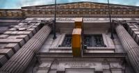 The Harlem Savings Bank on 125th Street in New York City featuring Halloway granite and a massive analog clock built in 1907. - ©2025 Salem Krieger All Rights Reserved NYC Photographer