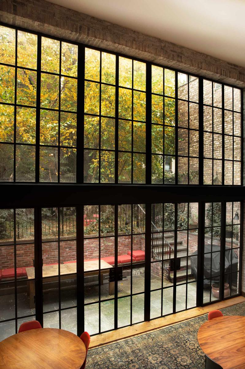 Floor to ceiling windows opening out an entire wall to view the backyard space in an inner-city home. : Miscellaneous Architectural Projects : New York NY Architectural Photographer | Interior and Exterior Photography